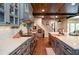 Kitchen features long countertops, stainless appliances, and a wood plank ceiling at 965 Tiverton Ln, Alpharetta, GA 30022