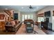 Spacious living room with hardwood floors, large windows, and access to the outdoor area at 965 Tiverton Ln, Alpharetta, GA 30022