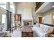 Bright living room with fireplace and tall ceilings at 965 Tiverton Ln, Alpharetta, GA 30022