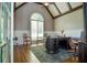 Spacious office with vaulted ceiling, large arched window, and executive-style desk at 965 Tiverton Ln, Alpharetta, GA 30022