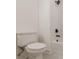 Close-up of a bathroom featuring a toilet and a shower/tub with black hardware and fixtures at 4075 O Henry Ct, Mcdonough, GA 30252
