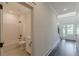 Bathroom showing a tub with shower, toilet, and vanity with dark fixtures at 4075 O Henry Ct, Mcdonough, GA 30252