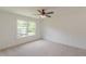 Bedroom features neutral carpeting, natural light and ceiling fan at 4075 O Henry Ct, Mcdonough, GA 30252