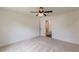 Bedroom featuring neutral carpeting, ceiling fan, natural light and access to bathroom at 4075 O Henry Ct, Mcdonough, GA 30252