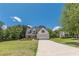Charming two-story home with a brick and siding facade, well-manicured lawn, and a two-car garage at 4075 O Henry Ct, Mcdonough, GA 30252