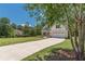 Charming two-story home with a brick and siding facade, well-manicured lawn, and a two-car garage at 4075 O Henry Ct, Mcdonough, GA 30252