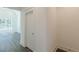 Hallway featuring wood floors, white trim and doors, and high ceilings at 4075 O Henry Ct, Mcdonough, GA 30252