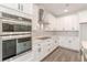 Modern kitchen with stainless steel appliances, and white cabinets at 4075 O Henry Ct, Mcdonough, GA 30252