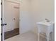 Mud room includes a utility sink and access to a separate room at 4075 O Henry Ct, Mcdonough, GA 30252