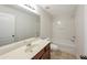 Clean bathroom with a single vanity, tub-shower combination, and neutral finishes at 436 Crestmont Ln, Canton, GA 30114