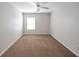 Bedroom with neutral walls, carpet, ceiling fan, and one window allowing lots of natural light at 436 Crestmont Ln, Canton, GA 30114