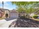 Charming two-story brick home with a well-manicured lawn and two car garage at 436 Crestmont Ln, Canton, GA 30114