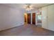 Bedroom with a ceiling fan and closet featuring mirrored doors at 5166 Vivid Dr, Stone Mountain, GA 30087