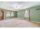 Living room featuring large windows with curtains at 5166 Vivid Dr, Stone Mountain, GA 30087