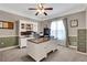 Spacious home office with custom built-ins and ample workspace at 940 Planters Pl, Loganville, GA 30052
