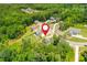 Nestled in lush greenery, a pinpointed home offers tranquility within a vibrant neighborhood at 1013 Liberty Springs Dr, Woodstock, GA 30188