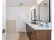 Bathroom with a double sink vanity, modern fixtures, and a clean, contemporary design at 1013 Liberty Springs Dr, Woodstock, GA 30188