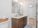 Bright bathroom featuring a double vanity with ample counter space and modern fixtures at 1013 Liberty Springs Dr, Woodstock, GA 30188
