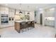 Beautiful eat-in kitchen with a large island, stainless steel appliances, and neutral-color cabinets at 1013 Liberty Springs Dr, Woodstock, GA 30188