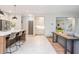 Spacious eat-in kitchen with a large island, stainless steel appliances, and a great flow to the living area at 1013 Liberty Springs Dr, Woodstock, GA 30188