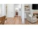 Cozy living room showcasing a fireplace, built-in shelves, and a comfortable recliner for relaxing and unwinding at 1013 Liberty Springs Dr, Woodstock, GA 30188