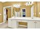 Double sink vanity with a large mirror and separate rooms at 2949 Spotted Pony Nw Ct, Acworth, GA 30101