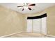 Bedroom with carpet and bay window with decorative drapes at 2949 Spotted Pony Nw Ct, Acworth, GA 30101