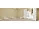 Spacious bedroom with neutral carpeting and adjoining bathroom entrance; bright and airy at 2949 Spotted Pony Nw Ct, Acworth, GA 30101