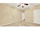 Bedroom with neutral carpet, ceiling fan, and decorative drapes at 2949 Spotted Pony Nw Ct, Acworth, GA 30101