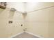 Bright laundry room with shelf and hookups at 2949 Spotted Pony Nw Ct, Acworth, GA 30101