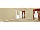 Large main bedroom with carpet, tray ceiling, and ensuite access at 2949 Spotted Pony Nw Ct, Acworth, GA 30101