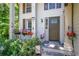 Inviting front porch with colorful flower baskets and a 'Welcome' sign at 3006 Durban Ct, Decatur, GA 30034