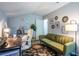Bright and inviting office space featuring a comfortable sofa and a well-lit desk area at 3006 Durban Ct, Decatur, GA 30034