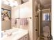 Bathroom featuring a glass enclosed shower, vanity with a mirror, and neutral colors at 510 Whistlestop Dr, Woodstock, GA 30189