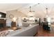 Inviting living room with a stone fireplace, vaulted ceiling, and an open floor plan at 510 Whistlestop Dr, Woodstock, GA 30189