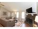 Relaxing living room showcases a stone fireplace and open layout at 510 Whistlestop Dr, Woodstock, GA 30189