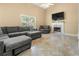Living room features fireplace, high ceilings, and lots of seating at 5125 Winding Glen Dr, Lithonia, GA 30038