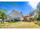 Large, fenced-in backyard with covered patio and ample space for outdoor activities at 1015 Carriage Way, Loganville, GA 30052