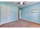 Bedroom featuring soft blue walls, a neutral carpet, and bright white trim at 1015 Carriage Way, Loganville, GA 30052