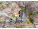 Aerial view of the property with the roof, driveway, and surrounding land at 2796 County Line Rd, Acworth, GA 30101