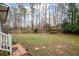 Large backyard is enclosed with wood fence, and provides ample space at 2796 County Line Rd, Acworth, GA 30101