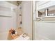 Clean and bright bathroom with a tiled shower/tub combination, wainscoting and grab bars at 2796 County Line Rd, Acworth, GA 30101