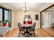 Elegant dining room with hardwood floors and modern lighting, ideal for entertaining guests at 2796 County Line Rd, Acworth, GA 30101