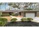 Charming ranch style home featuring a two-car garage and inviting front patio area at 2796 County Line Rd, Acworth, GA 30101