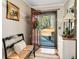 Inviting foyer with a bench, decorative accents, and a view to the outdoors at 2796 County Line Rd, Acworth, GA 30101