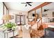Open living space featuring a wood frame, wood-burning stove, and multiple seating areas at 2796 County Line Rd, Acworth, GA 30101