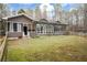 Backyard showing the sun room, rear yard, and fence at 2796 County Line Rd, Acworth, GA 30101