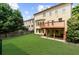 Expansive backyard showcasing a deck, patio, and lush lawn, ideal for outdoor enjoyment at 3086 Frazier Walk, Decatur, GA 30033