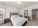 Bedroom featuring a bed, two windows, and a desk in the corner at 3086 Frazier Walk, Decatur, GA 30033