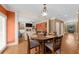 Cozy dining area with table for four, open to living room, and full of natural light at 3086 Frazier Walk, Decatur, GA 30033